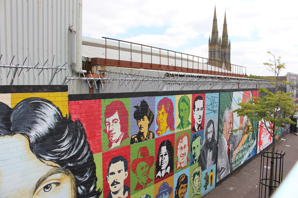 Murals around Peace Wall west Belfast Northern Ireland: Belfast city break